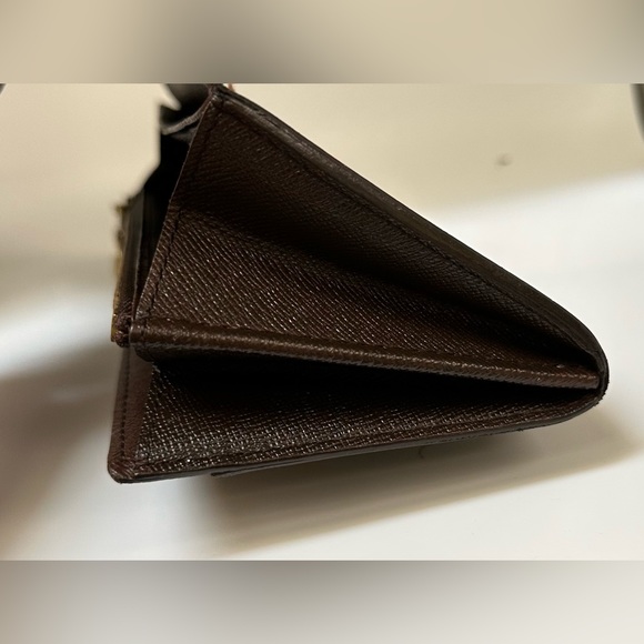 Authentic Louis Vuitton Damier Ebene Sarah wallet from 2005 in used condition. - Picture 12 of 15